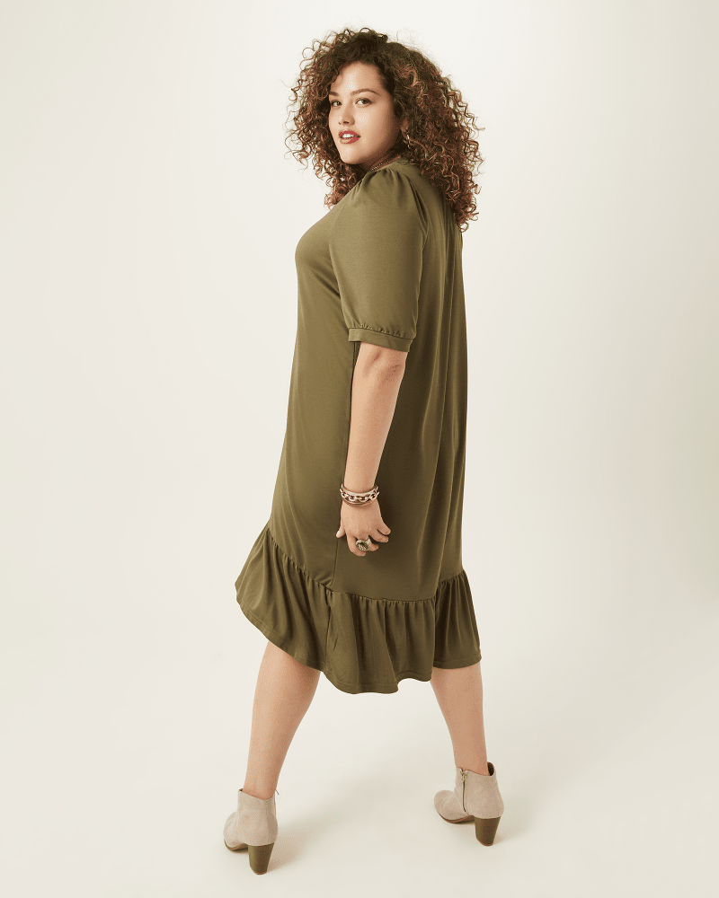 Plus size model with hourglass body shape wearing Ainsley Ruffle-Hem Dress by Vero Moda | Dia&Co | dia_product_style_image_id:168906